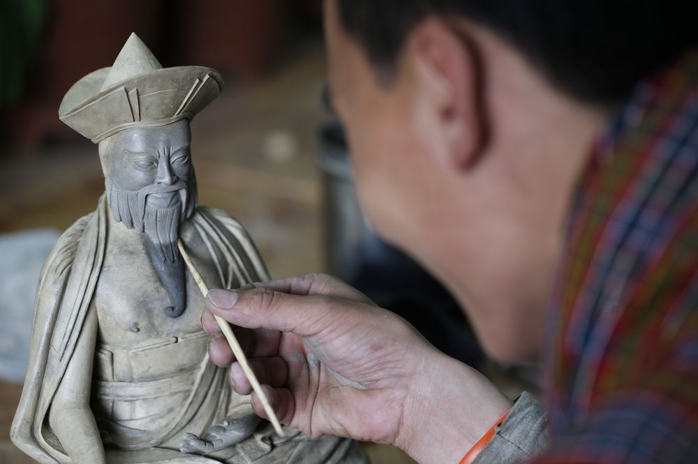 Hand-Cast Clay Statues